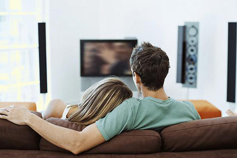 Watchin TV sitting on a couch